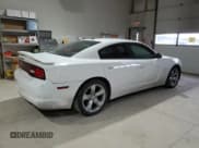 ✅ 2013 Dodge Charger SXT • VIN: 2C3CDXHGXDH546712 • Lot: 81340984. Listed on Copart with 155,146 mi. Free auction sales archive from the USA and detailed vehicle history report at DreamBid. Image 3.