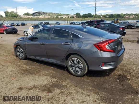 ✅ 2018 Honda Civic EX-L • VIN: JHMFC1F77JX044158 • Lot: 71030545. Listed on Copart with 71,794 mi. Free auction sales archive from the USA and detailed vehicle history report at DreamBid. Image 2.