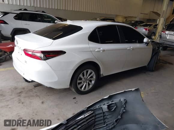 2022 Toyota Camry LE с VIN 4T1C11BK1NU054269, выставлен на аукционе IAAI как лот 41510460 с пробегом 60 997 миль миль и . История ставок и продаж доступна на DreamBid. Изображение 4.