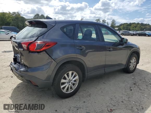 ✅ 2014 Mazda CX-5 Sport • VIN: JM3KE4BE1E0315978 • Лот: 84189845. Опубликован ранее на Copart с пробегом 213 871 миль. Бесплатный доступ к архиву аукционных продаж из США и подробный отчёт об истории автомобиля на DreamBid. Изображение 3.