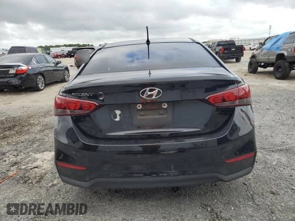 2018 Hyundai Accent SE z VIN 3KPC24A37JE033058, wystawiony jako Copart lot #71091264 z przebiegiem 134 356 mil mil oraz Szkoda całkowita • Salvage title. Historia ofert i sprzedaży dostępna na DreamBid. Obrazek 6.