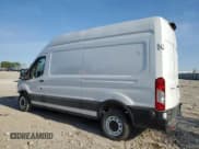 ✅ 2023 Ford Transit Cargo • VIN: 1FTBR1X85PKA18265 • Lot: 46714385. Listed on Copart with 62,737 mi. Free auction sales archive from the USA and detailed vehicle history report at DreamBid. Image 2.