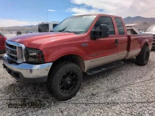 ✅ 1999 Ford F-250 XL • VIN: 1FTNX21F6XEF10401 • Lot: 67856105. Listed on Copart with 176,769 mi. Free auction sales archive from the USA and detailed vehicle history report at DreamBid. Image 1.