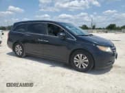 ✅ 2014 Honda Odyssey EX-L • VIN: 5FNRL5H64EB104570 • Lot: 56382095. Listed on Copart with 172,706 mi. Free auction sales archive from the USA and detailed vehicle history report at DreamBid. Image 4.