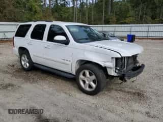 2007 Chevrolet Tahoe LTZ с VIN 1GNFC13007R183609, выставлен на аукционе Copart как лот 81827535 с пробегом 233 431 миль миль и Списание • Salvage title. История ставок и продаж доступна на DreamBid. Изображение 4.