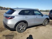 ✅ 2023 Honda HR-V EX-L • VIN: 3CZRZ2H7XPM729649 • Лот: 87460705. Опубликован ранее на Copart с пробегом 16 884 миль. Бесплатный доступ к архиву аукционных продаж из США и подробный отчёт об истории автомобиля на DreamBid. Изображение 3.