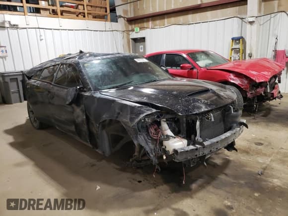 ✅ 2015 Dodge Charger RT • VIN: 2C3CDXCT3FH847121 • Lot: 69619225. Listed on Copart with 65,779 mi. Free auction sales archive from the USA and detailed vehicle history report at DreamBid. Image 4.