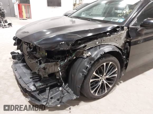 2020 Toyota Camry SE with VIN 4T1G11BK2LU004088, listed as a IAAI auction lot 42318280 with 76,053 mi miles and . Bid and sale history available at DreamBid. Image 6.