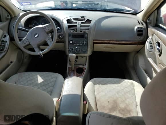 2005 Chevrolet Malibu LS z VIN 1G1ZT52865F125130, wystawiony jako Copart lot #74581174 z przebiegiem 134 100 mil mil oraz Szkoda całkowita • Salvage title. Historia ofert i sprzedaży dostępna na DreamBid. Obrazek 8.