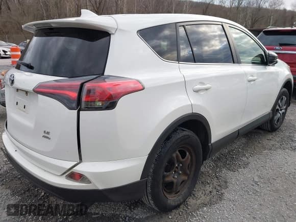 ✅ 2018 Toyota RAV4 LE • VIN: JTMBFREV7JJ214074 • Lot: 43688130. Listed on IAAI with 127,167 mi. Free auction sales archive from the USA and detailed vehicle history report at DreamBid. Image 4.