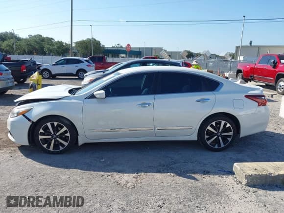 ✅ 2018 Nissan Altima SL • VIN: 1N4AL3AP0JC122839 • Лот: 43005542. Опубликован ранее на IAAI с пробегом 100 992 миль. Бесплатный доступ к архиву аукционных продаж из США и подробный отчёт об истории автомобиля на DreamBid. Изображение 15.
