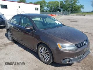 ✅ 2014 Volkswagen Jetta TDI w/Premium/Nav • VIN: 3VWLL7AJ8EM387791 • Lot: 42555967. Listed on IAAI with 218,829 mi. Free auction sales archive from the USA and detailed vehicle history report at DreamBid. Image 1.