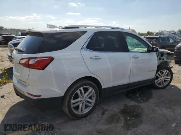 ✅ 2020 Chevrolet Equinox Premier • VIN: 3GNAXYEX6LS738166 • Лот: 84258915. Опубликован ранее на Copart с пробегом 31 868 миль. Бесплатный доступ к архиву аукционных продаж из США и подробный отчёт об истории автомобиля на DreamBid. Изображение 3.