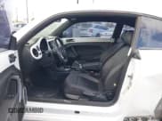 ✅ 2014 Volkswagen Beetle 1.8T • VIN: 3VWJ17AT1EM664666 • Lot: 42087614. Wystawiony na IAAI z przebiegiem 159 995 mil. Bezpłatny archiwum sprzedaży aukcyjnych z USA i szczegółowy raport historii pojazdu na DreamBid. Zdjęcie 5.