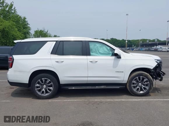 ✅ 2023 Chevrolet Tahoe LT • VIN: 1GNSKNKD7PR119905 • Lot: 42487598. Listed on IAAI with 25,440 mi. Free auction sales archive from the USA and detailed vehicle history report at DreamBid. Image 12.