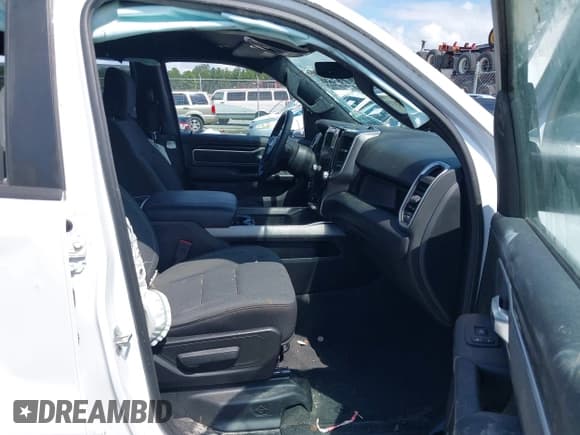 ✅ 2023 Ram 1500 Lone Star • VIN: 1C6SRFMT5PN599519 • Lot: 42921193. Listed on IAAI with 153,168 mi. Free auction sales archive from the USA and detailed vehicle history report at DreamBid. Image 5.