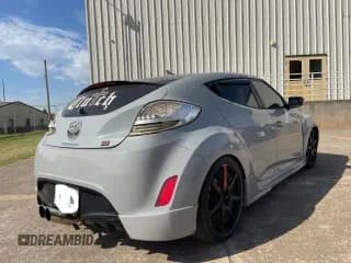 ✅ 2013 Hyundai Veloster w/Gray Int • VIN: KMHTC6AD5DU129192 • Lot: 76520404. Wystawiony na Copart z przebiegiem 108 688 mil. Bezpłatny archiwum sprzedaży aukcyjnych z USA i szczegółowy raport historii pojazdu na DreamBid. Zdjęcie 4.