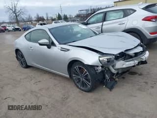 ✅ 2014 Subaru BRZ Premium • VIN: JF1ZCAB18E9603359 • Lot: 41123931. Wystawiony na IAAI z przebiegiem 99 327 mil. Bezpłatny archiwum sprzedaży aukcyjnych z USA i szczegółowy raport historii pojazdu na DreamBid. Zdjęcie 1.
