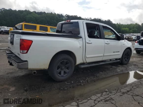 ✅ 2006 Nissan Titan LE • VIN: 1N6BA07A76N551183 • Лот: 53804515. Опубликован ранее на Copart с пробегом 216 816 миль. Бесплатный доступ к архиву аукционных продаж из США и подробный отчёт об истории автомобиля на DreamBid. Изображение 3.