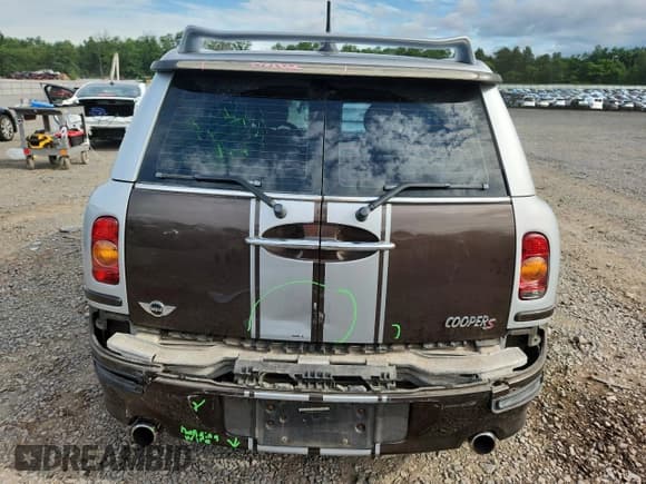 ✅ 2009 MINI Clubman S • VIN: WMWMM335X9TP89913 • Lot: 65537895. Listed on Copart with 127,679 mi. Free auction sales archive from the USA and detailed vehicle history report at DreamBid. Image 6.