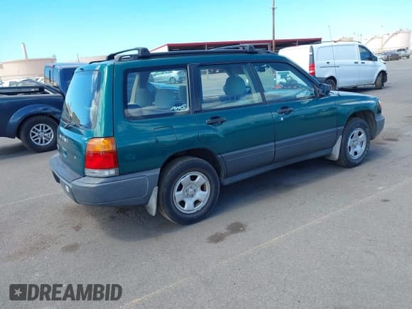 ✅ 1998 Subaru Forester L • VIN: JF1SF6355WH769904 • Lot: 42750427. Listed on IAAI with 71,530 mi. Free auction sales archive from the USA and detailed vehicle history report at DreamBid. Image 4.
