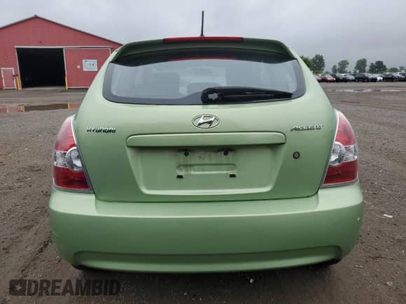 2010 Hyundai Accent L with VIN KMHCN3BC0AU159338, listed as a Copart auction lot 69067755 with 112,088 mi miles and Salvage title. Bid and sale history available at DreamBid. Image 6.