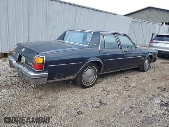 ✅ 1985 Oldsmobile Delta Royale • VIN: 1G3BN69YXF9080322 • Lot: 78670094. Wystawiony na Copart z przebiegiem 58 231 mil. Bezpłatny archiwum sprzedaży aukcyjnych z USA i szczegółowy raport historii pojazdu na DreamBid. Zdjęcie 3.