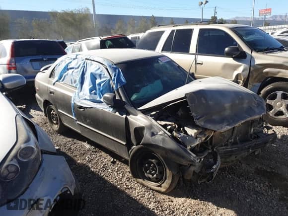 2002 Hyundai Accent GL с VIN KMHCG45C92U305295, выставлен на аукционе Copart как лот 43836105 с пробегом 92 435 миль миль и На запчасти • Non repairable. История ставок и продаж доступна на DreamBid. Изображение 4.