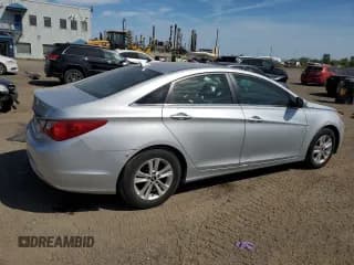 ✅ 2013 Hyundai Sonata GLS • VIN: 5NPEB4AC9DH637638 • Lot: 69051544. Listed on Copart with 125,099 mi. Free auction sales archive from the USA and detailed vehicle history report at DreamBid. Image 3.