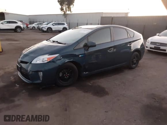 ✅ 2015 Toyota Prius Three • VIN: JTDKN3DU3F0448752 • Lot: 43615965. Listed on IAAI with 104,654 mi. Free auction sales archive from the USA and detailed vehicle history report at DreamBid. Image 2.