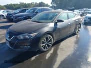 ✅ 2016 Nissan Maxima Platinum • VIN: 1N4AA6APXGC420718 • Lot: 43141870. Wystawiony na IAAI z przebiegiem 182 289 mil. Bezpłatny archiwum sprzedaży aukcyjnych z USA i szczegółowy raport historii pojazdu na DreamBid. Zdjęcie 2.