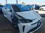 2021 Toyota Prius L Eco with VIN JTDKAMFU4M3134943, listed as a IAAI auction lot 43175713 with 106,611 mi miles and . Bid and sale history available at DreamBid. Image 1.