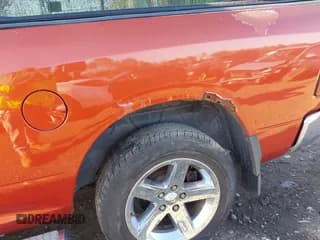 ✅ 2009 Dodge 1500 SLT • VIN: 1D3HV18T39S731832 • Lot: 42039890. Wystawiony na IAAI z przebiegiem 176 812 mil. Bezpłatny archiwum sprzedaży aukcyjnych z USA i szczegółowy raport historii pojazdu na DreamBid. Zdjęcie 6.