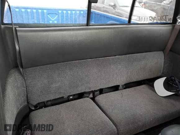 1999 Dodge Dakota Sport z VIN 1B7GL22Z7XS110023, wystawiony jako Copart lot #85889754 z przebiegiem Nie podano mil oraz Szkoda całkowita • Salvage title. Historia ofert i sprzedaży dostępna na DreamBid. Obrazek 10.