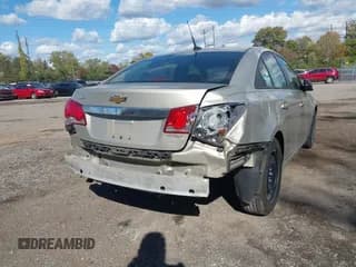 ✅ 2014 Chevrolet Cruze LS • VIN: 1G1PA5SG4E7425909 • Lot: 43494913. Listed on IAAI with 76,172 mi. Free auction sales archive from the USA and detailed vehicle history report at DreamBid. Image 6.