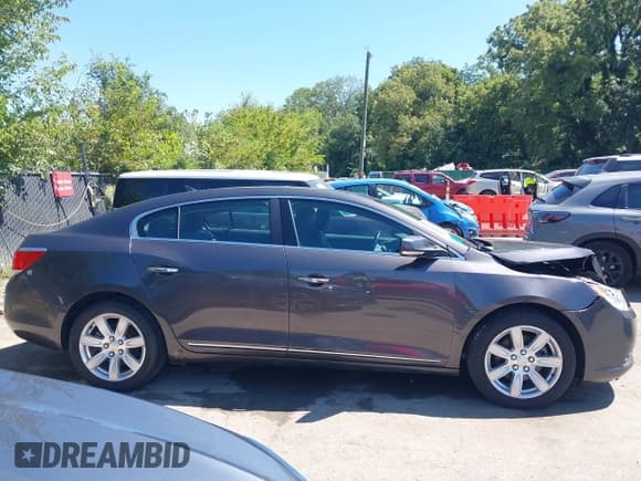 ✅ 2013 Buick LaCrosse Leather • VIN: 1G4GC5E30DF120367 • Лот: 43093786. Опубликован ранее на IAAI с пробегом 132 953 миль. Бесплатный доступ к архиву аукционных продаж из США и подробный отчёт об истории автомобиля на DreamBid. Изображение 13.