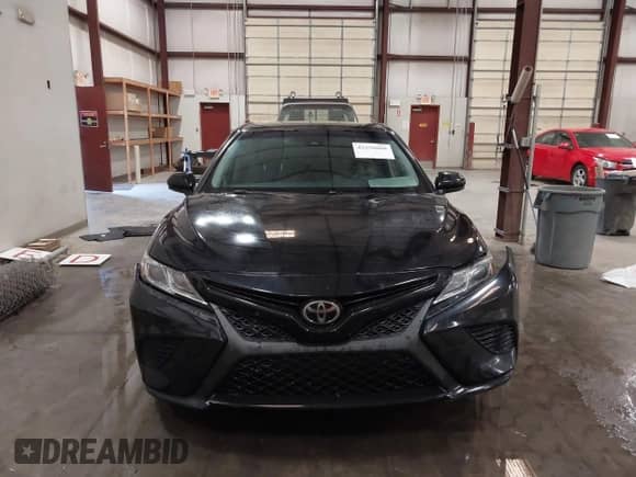 2019 Toyota Camry LE with VIN JTNB11HK0K3080138, listed as a IAAI auction lot 43236866 with 98,032 mi miles and . Bid and sale history available at DreamBid. Image 13.