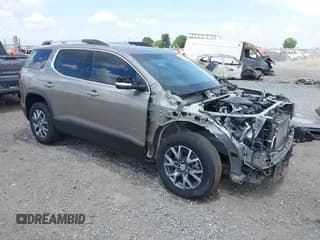 ✅ 2023 GMC Acadia SLT • VIN: 1GKKNULS0PZ124892 • Lot: 42564480. Listed on IAAI with 63,906 mi. Free auction sales archive from the USA and detailed vehicle history report at DreamBid. Image 1.