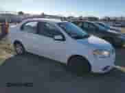 2010 Chevrolet Aveo 1LT z VIN KL1TD5DE6AB101335, wystawiony jako Copart lot #83634594 z przebiegiem 118 386 mil mil oraz Szkoda całkowita • Salvage title. Historia ofert i sprzedaży dostępna na DreamBid. Obrazek 4.