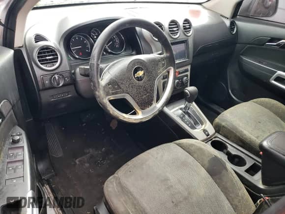 2014 Chevrolet Captiva Sport LS z VIN 3GNAL2EK6ES674243, wystawiony jako Copart lot #81742154 z przebiegiem 185 254 mil mil oraz Czysty tytuł • Clean title. Historia ofert i sprzedaży dostępna na DreamBid. Obrazek 8.