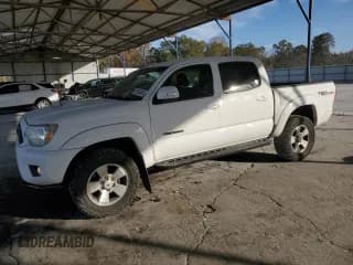 ✅ 2015 Toyota Tacoma • VIN: 3TMLU4EN2FM182321 • Lot: 92693405. Listed on Copart with 214,806 mi. Free auction sales archive from the USA and detailed vehicle history report at DreamBid. Image 1.