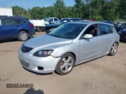 ✅ 2005 Mazda 3 s • VIN: JM1BK143351260133 • Lot: 42947331. Listed on IAAI with 158,209 mi. Free auction sales archive from the USA and detailed vehicle history report at DreamBid. Image 2.