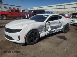 ✅ 2023 Chevrolet Camaro 1LT • VIN: 1G1FB1RX6P0161062 • Lot: 68050325. Listed on Copart with 16,868 mi. Free auction sales archive from the USA and detailed vehicle history report at DreamBid. Image 1.