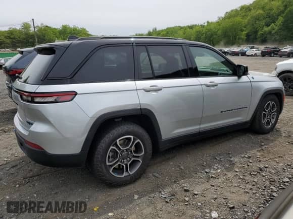2022 Jeep Grand Cherokee Trailhawk z VIN 1C4RJYC62N8715910, wystawiony jako Copart lot #58785405 z przebiegiem 21 976 mil mil oraz Szkoda całkowita • Salvage title. Historia ofert i sprzedaży dostępna na DreamBid. Obrazek 3.
