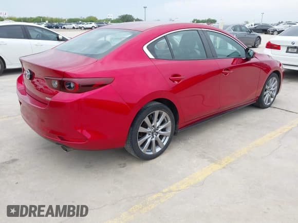 ✅ 2022 Mazda 3 Select • VIN: 3MZBPABL9NM316998 • Lot: 42117951. Listed on IAAI with 44,594 mi. Free auction sales archive from the USA and detailed vehicle history report at DreamBid. Image 4.