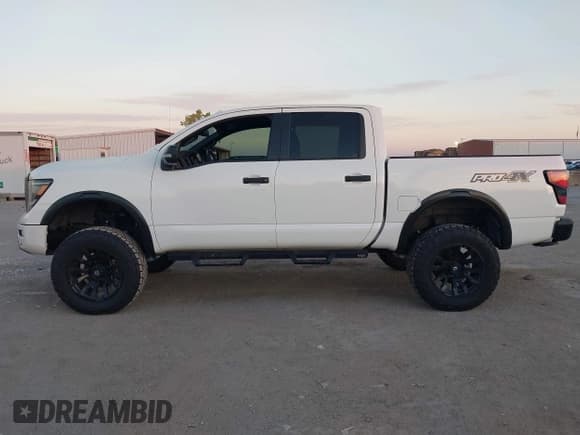 ✅ 2020 Nissan Titan SL • VIN: 1N6AA1ED1LN510557 • Lot: 43413407. Listed on IAAI with 48,074 mi. Free auction sales archive from the USA and detailed vehicle history report at DreamBid. Image 14.