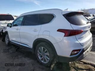 ✅ 2019 Hyundai Santa Fe SEL • VIN: 5NMS3CAD8KH057052 • Лот: 39384233. Опубликован ранее на Copart с пробегом 49 927 миль. Бесплатный доступ к архиву аукционных продаж из США и подробный отчёт об истории автомобиля на DreamBid. Изображение 2.