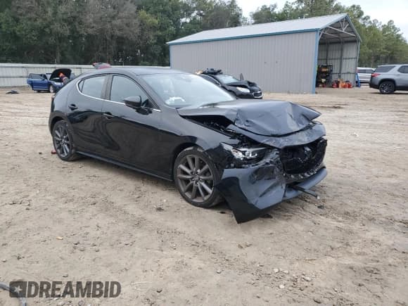 ✅ 2021 Mazda 3 Select • VIN: JM1BPAKLXM1400374 • Lot: 90520335. Listed on Copart with 49,599 mi. Free auction sales archive from the USA and detailed vehicle history report at DreamBid. Image 4.