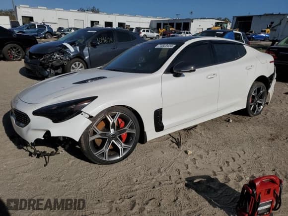 ✅ 2021 Kia Stinger GT2 • VIN: KNAE55LC1M6089121 • Lot: 74823434. Listed on Copart with 25,009 mi. Free auction sales archive from the USA and detailed vehicle history report at DreamBid. Image 1.