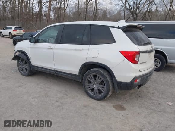 ✅ 2021 Honda Passport EX-L • VIN: 5FNYF8H55MB004813 • Lot: 41262942. Listed on IAAI with 69,585 mi. Free auction sales archive from the USA and detailed vehicle history report at DreamBid. Image 3.